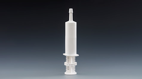What is the function of the positioning ring on paste syringe