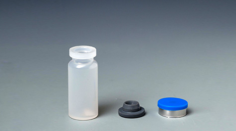 Cap characteristics of plastic vaccine bottles