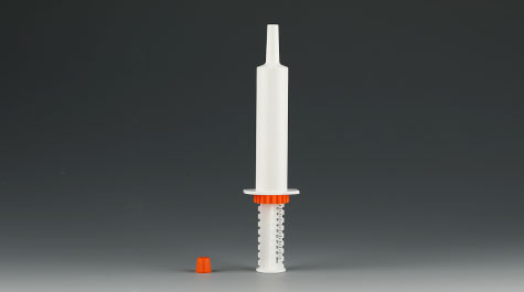 Plastic syringes in equine medicine packaging