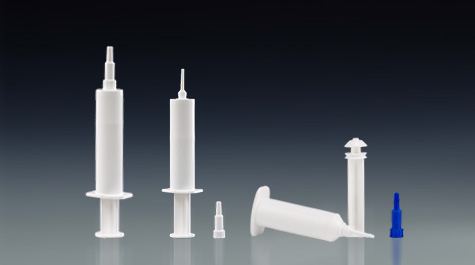 Four Applications of Plastic Animal Health Syringes