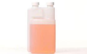 Bottle with dispensing chamber